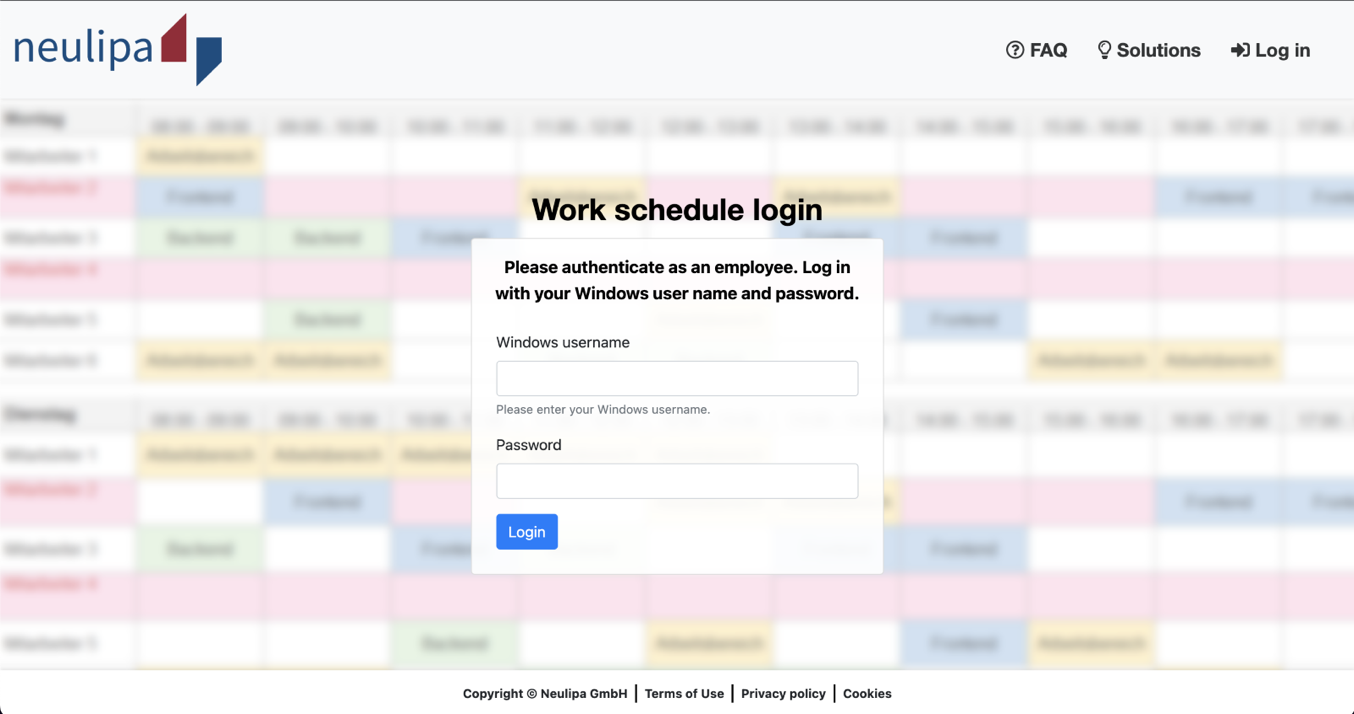 Example interactive phishing template disguised as a company work schedule tool named Neulipa, with a Work schedule login dialog asking for a Windows username and password over a blurred shift schedule, illustrating how the simulation tries to collect employee credentials.