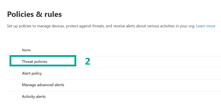 Policies and rules page in Microsoft 365 Defender, with Threat policies marked 2 in the list, alongside Alert policy, Manage advanced alerts, and Activity alerts.