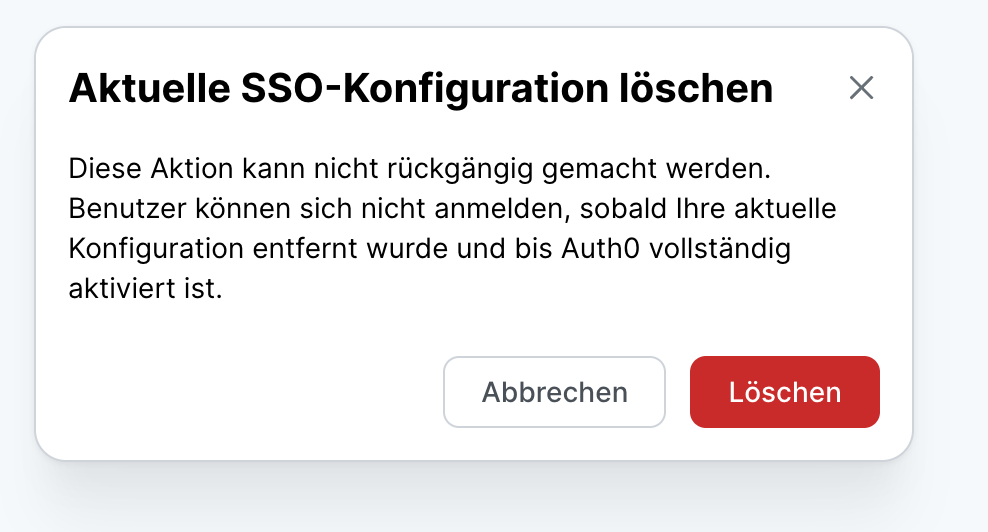 Bestätigungsdialog Aktuelle SSO-Konfiguration löschen mit dem Hinweis, dass sich Benutzer bis zur vollständigen Aktivierung von Auth0 nicht anmelden können. Darunter die Schaltflächen Abbrechen und Löschen.
